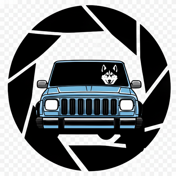 Blue Jeep with a dog on the windshield inside a black geometric circle